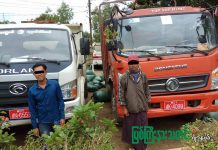 ကျွန်းသစ်များကို စပါးခွံအိတ်များဖြင့် ဖုံးဖိ သယ်ဆောင်လာသော ခြောက်ဘီးကား နှစ်စီးနှင့် လူသုံးယောက်ကို ဖမ်းဆီး