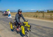 မြန်မာပြည် မြောက်ဖျားဘက်မှ တောင်ဘက်ဖျားထိ စက်ဘီးစီးခရီးနှင်နေသူ ဝင်းကိုကို